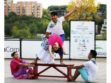 Members of the Kumintang Folk Dance group during dancing and musical entertainment at River Landing during the PotashCorp Fireworks Festival, September 2, 2016.