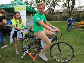 Oscar Bressen, a third-year agro student, cycles to provide the energy for making a smoothie in a booth set up by the office of sustainability. Students were participating in orientation activities at the University of Saskatchewan for all new students entering the colleges of Agriculture and Bioresources, Arts and Science, Education, Edwards School of Business, Engineering, Kinesiology, St. Thomas More College, Graduate Studies and Research in the Bowl, Friday, September 02, 2016.