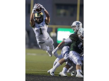 Regina Rams' Jens Johnson leaps into the end zone with an apparent touchdown against the Huskies but the play was called back on a holding penalty in CIS University football action at Griffiths Stadium in Saskatoon, September 2, 2016.