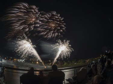 Spectators watch fireworks at the PotashCorp Fireworks Festival at River Landing in Saskatoon, September 3, 2016.