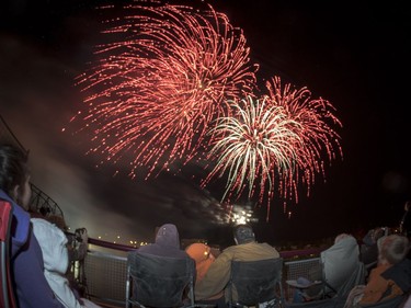 Spectators watch fireworks at the PotashCorp Fireworks Festival at River Landing in Saskatoon, September 3, 2016.