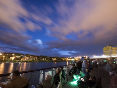 Spectators wait for the PotashCorp Fireworks Festival fireworks to start at River Landing in Saskatoon, September 3, 2016.