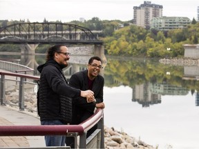 World-renowned artist and community organizer Rick Lowe, right, with Marcel Petit at River Landing, tours around Saskatoon, on Sept. 7, 2016.