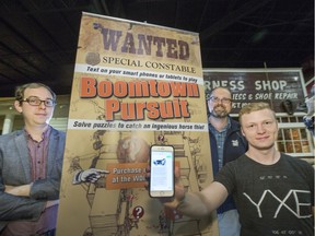 A few of the minds behind the Boomtown Pursuit, a digital scavenger hunt, which sends clues directly to your phone through text messaging, l to r, Adam Bissonnette, Scott Whiting and Chris Penner, at the Western Development Museum.