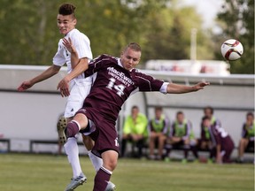 Bennett Foster of the Grant McEwan Griffins, right, goes against Marcello Gonzalez of the University of Saskatchewan Huskies in CIS soccer action at Potash Corp Park in Saskatoon, Friday, September 09, 2016.