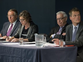 L-R: Mayoral candidates Don Atchison, Kelley Moore, Henry Dayday and Charlie Clark during a town hall meeting at Cathedral of the Holy Family hosted by Canadian Condominium Institute North Saskatchewan Branch, September 14, 2016.