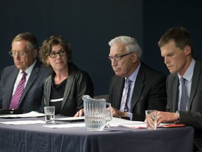 SASKATOON,SK-- September 14/2016 0915 news mayor candidates Mayoral candidates, from left, Mayor Don Atchison, Kelley Moore, Henry Dayday and Coun. Charlie Clark, appear at a town hall meeting at the Cathedral of the Holy Family hosted by the Canadian Condominium Institute North Saskatchewan Branch, Wednesday, September 14, 2016. (GREG PENDER/STAR PHOENIX)