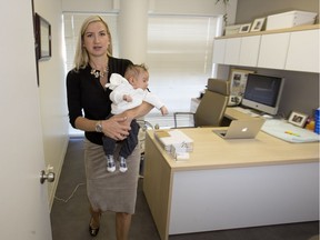 Saskatoon rheumatologist Dr. Jodie Reis didn't waste any time going back to work after giving birth to her son, Wyatt, in July. (GREG PENDER/STAR PHOENIX)