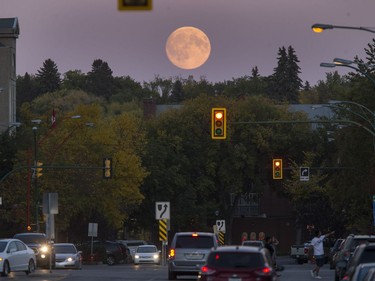 A full moon rises over Saskatoon in the early evening, September 15, 2016.
