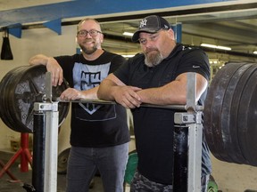 Saskatoon powerlifter Brian Bailey (right) and trainer Jeff Drake are headed to the world championship.
