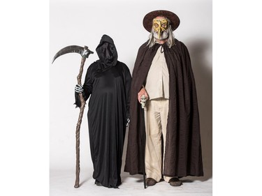 Aselle Anderson as Grim Reaper/Death (L) and Bruce Anderson, as a Plague Doctor pose for a photograph during the Saskatoon Comic and Entertainment Expo at Prairieland Park in Saskatoon, September 17, 2016.