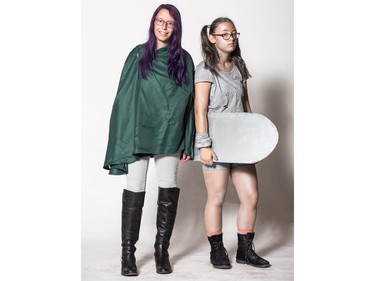 haeleigh Anderson as a Attack of Titan Soldier (L) and Allison Meckling as Cilia Quinn pose for a photograph during the Saskatoon Comic and Entertainment Expo at Prairieland Park in Saskatoon, September 17, 2016.