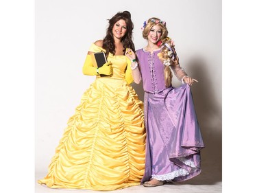 Belle and Rapunzel pose for a photograph during the Saskatoon Comic and Entertainment Expo at Prairieland Park in Saskatoon, September 17, 2016.