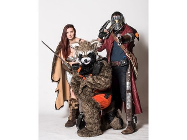 L-R: Brianne Yawortei as Red Sonja, Jean-Paul Belanger, as Rocket Raccoon and Kris Brehaut as Star Lord pose for a photograph during the Saskatoon Comic and Entertainment Expo at Prairieland Park in Saskatoon, September 17, 2016.