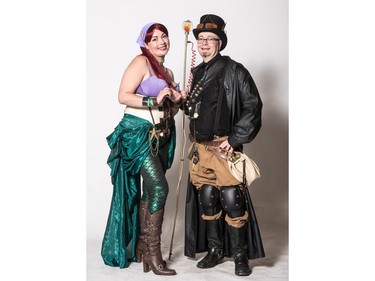 Sharon Givens as Steampunk Ariel (L) and Kevin Bichon as a Steampunk Cogs-mere Mashup pose for a photograph during the Saskatoon Comic and Entertainment Expo at Prairieland Park in Saskatoon, September 17, 2016.