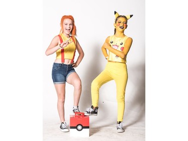 Jaylin Vanthuyne as Misty (L) and Claire Nelson as Pikachu pose for a photograph during the Saskatoon Comic and Entertainment Expo at Prairieland Park in Saskatoon, September 17, 2016.