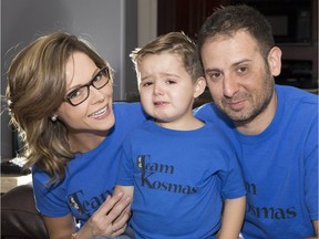 Demitrios Kosmas, with mom Kayla Schaan and dad George Kosmas pose for a photo in their home, Wednesday, September 21, 2016.