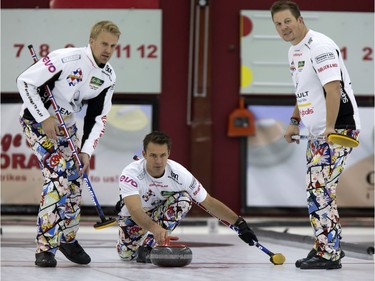 Skip Thomas Uslrud (C) with sweepers Havard Vad Petersson and Christoffer Svae in action during the championship final in the World Curling Tour's College Clean Restoration Curling Classic at the Nutana Curling Club, September 26, 2016.