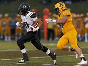 Saskatchewan's Chad Braun runs the ball upfield during last Friday's game against the Alberta Golden Bears.