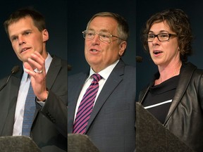 Saskatoon mayoral candidate Kelley Moore, foreground, speaks at a forum at Prairieland Park Wednesday with, from left, Don Atchison, Charlie Clark and Devon Hein.