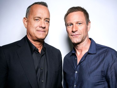 Tom Hanks (L) and Aaron Eckhart pose for a portrait in promotion of "Sully" in Los Angeles, August 28, 2016.