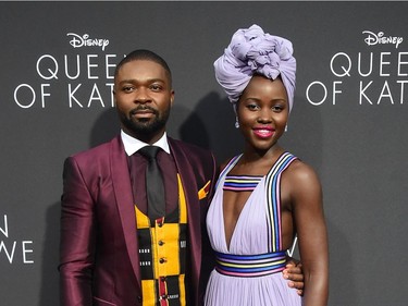 Actors David Oyelowo and Lupita Nyong'o pose as they arrive for the premiere of Disney's "Queen of Katwe" in Hollywood, California, September 20, 2016.