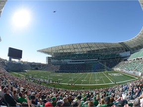 A jet does a fly-by during Saturday's clash between the Saskatchewan Huskies and Regina Rams at new Mosaic Stadium.