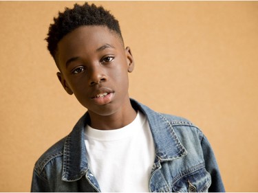 Actor Alex Hibbert, a cast member in "Moonlight," poses at A24 offices in New York, October 3, 2016.