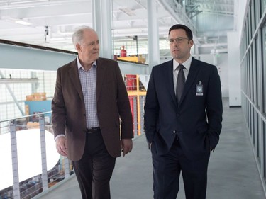John Lithgow (L) and Ben Affleck star in "The Accountant."