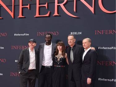 L-R: Ron Howard, Omar Sy, Felicity Jones, Tom Hanks and Dan Brown pose at CineStar IMAX Sony Centre at Potsdamer Platz Square in Berlin, Germany, October 10, 2016.