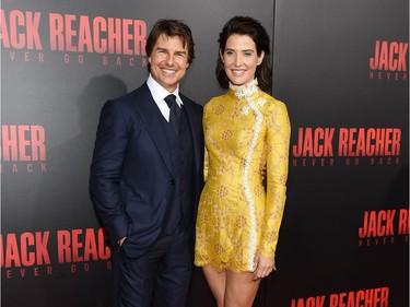 Actors Tom Cruise and Cobie Smulders attend the fan screening of "Jack Reacher: Never Go Back" on October 16, 2016 at the AMC Elmwood in New Orleans, Louisiana.