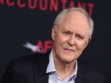 John Lithgow arrives at the world premiere of "The Accountant" at the TCL Chinese Theatre on October 10, 2016 in Los Angeles, California.