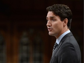 Prime Minister Justin Trudeau delivers a speech at the start of the Paris Agreement debate in the House of Commons on Parliament Hill in Ottawa on Monday, Oct. 3, 2016.