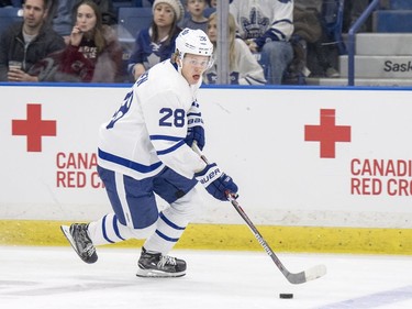 Toronto Maple Leafs forward Kasperi Kapanen moves the puck against the Ottawa Senators during the first period of an NHL pre-season hockey game in Saskatoon, October 4, 2016.