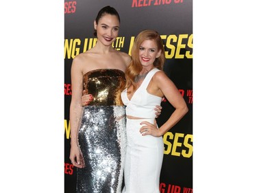 Gal Gadot and Isla Fisher attend the "Keeping Up with the Joneses" Red Carpet Event at the Twentieth Century Fox on October 8, 2016 in Los Angeles, California.