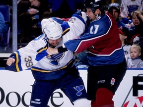 Kelly Chase (left) says there's honour to be found in the rough and tumble life of a hockey enforcer.