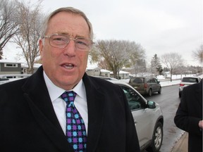 Mayoral candidate, Don Atchison speaks following a press conference held near the intersection of Avenue P North and 29th Street West on Tuesday morning. He said he plans to revamp neighbourhood street paving if re-elected when voters head to the polls on Oct. 26.