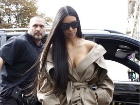 Kim Kardashian is spotted out and about in Paris, France during Paris Fashion Week just hours before the reality star was held at gunpoint in her hotel room in the city on Sunday (02Oct16). After returning to her hotel room, Kim was confronted by two men dressed as police officers, who proceeded to keep her captive in the room. The incident is believed to have happened at some time between 3 and 4am, Central European Time (CET).  Featuring: Kim Kardashian Where: Paris, France When: 02 Oct 2016 Credit: WENN.com  **Not available for publication in France** ORG XMIT: wenn29622991