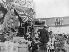 Prime Minister Wilfrid Laurier (greeting twins) made a special prairie tour in 1910 to shore up western support for the Liberal party. (SASKATCHEWAN ARCHIVES BOARD R-B1866)