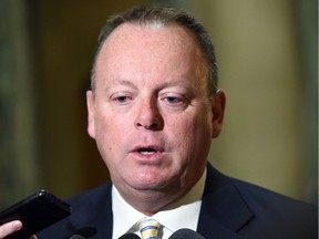 Finance Minister Kevin Doherty's mid-year budget update projects a $1-billion shortfall.