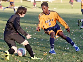 File Photo OCT. 14, 2015-Centennial Chargers Luke Wilson (left) goes head to head with Evan Hardy Souls Oore Peter in game action at Weaver Field on October 14, 2015 in Saskatoon. {RICHARD MARJAN/The StarPhoenix}