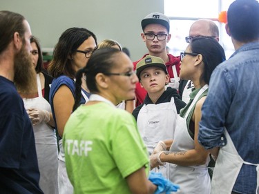 Volunteers were being prepped before the annual Thanksgiving Day meal at the Friendship Inn where more than 20 volunteers of all ages, along with staff members, served dinner to the needy that were seated, lined up inside and outside waiting for a warm turkey meal, October 10, 2016.