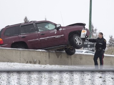 A fresh layer of snow made roads like Circle Drive northbound slippery catching this driver by surprise, October 11, 2016.