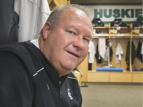Brian Towriss, head coach of the Huskies, sits in the team's dressing room.