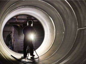 A worker at Mitsubishi Hitachi Power Systems Canada Ltd.'s Saskatoon facility. The plant's manufacturing division ceased operations this month, resulting in about 150 job losses.