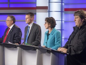 SASKATOON, SASK.; OCTOBER 20, 2016 - 1021 news mayoral forum (L-R)  Don Atchison, Charlie Clark and Kelley Moore with Devon Hein are the 4 mayoral candidates that were in the CTV studios and live on television answering questions, October 20, 2016 (GORD WALDNER/Saskatoon StarPhoenix)