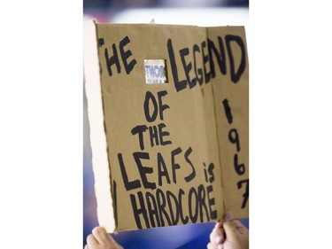 Fans don the jersey of their favourite team as the NHL's Toronto Maple Leafs and Ottawa Senators play an exhibition game in Saskatoon, October 4, 2016.