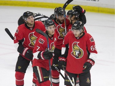 The Ottawa Senators celebrate their first goal, a shorthanded goal scored by Derek Brassard against the Toronto Maple Leafs in first period NHL exhibition play at SaskTel Centre in Saskatoon, October 4, 2016.