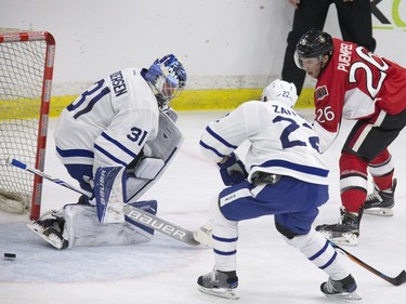Ottawa Senators #26 Matthew Puempel misses a shot against Toronto Maple Leafs goalie #31 Fredrick Anderson in first period NHL exhibition play at SaskTel Centre in Saskatoon, October 4, 2016.