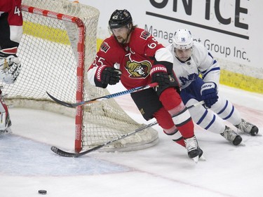 Ottawa Senators #65 Erik Karlsson hustles around his own net against the Toronto Maple Leafs in first period NHL exhibition play at SaskTel Centre in Saskatoon, October 4, 2016.
